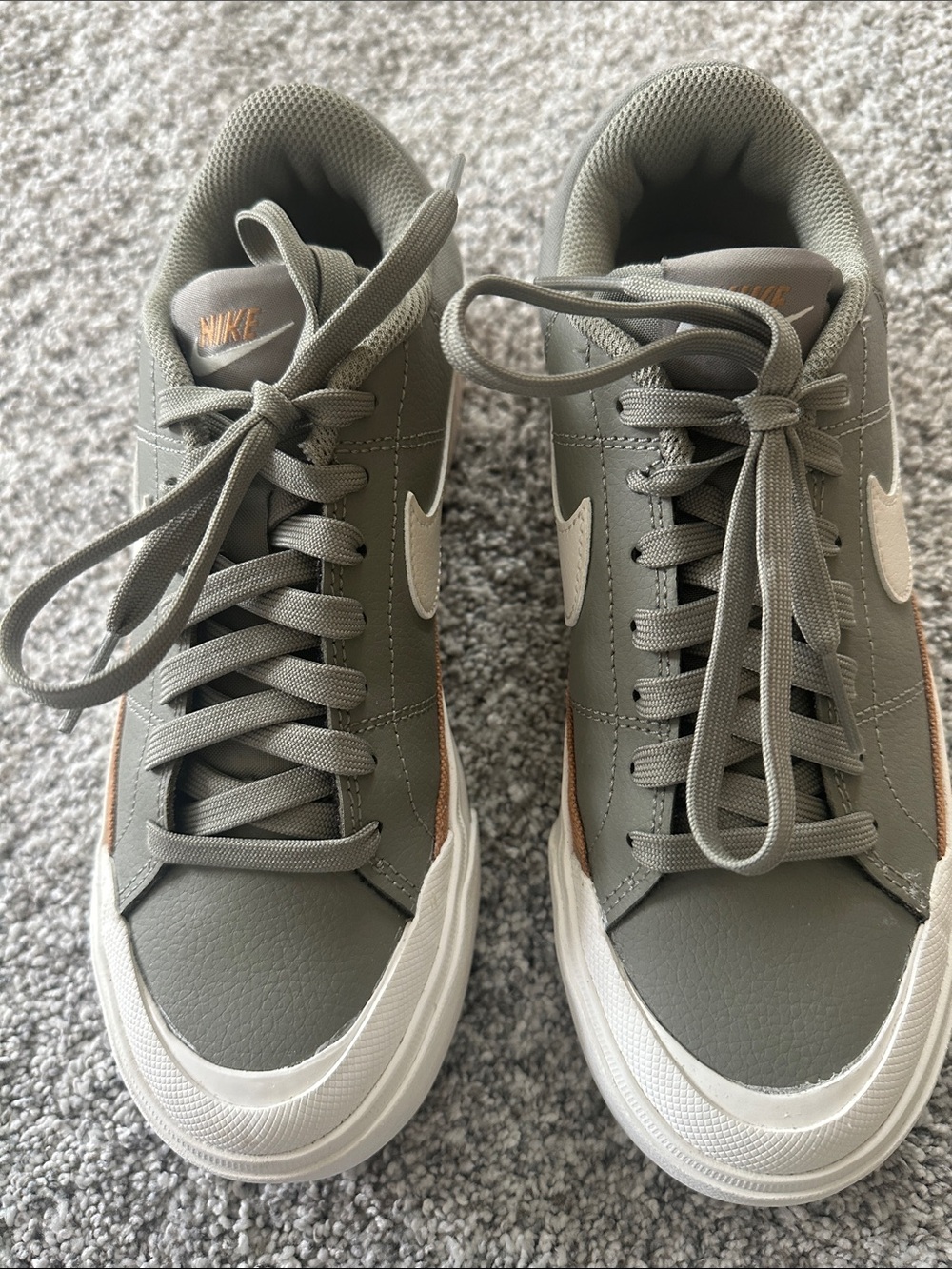Nike Olive Green Low-Top Sneakers with White Swoosh and Copper Accent